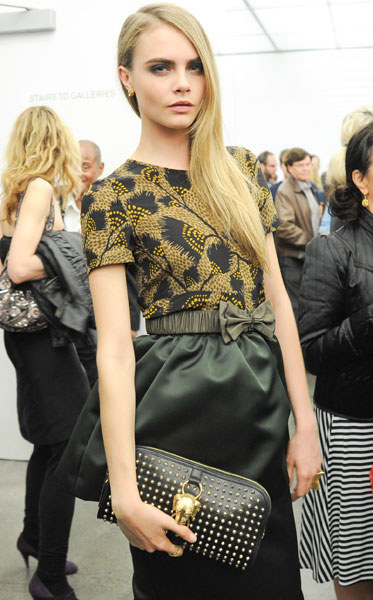 cara-delevingne-and-burberry-country-animal-studded-clutch-bag-gallery